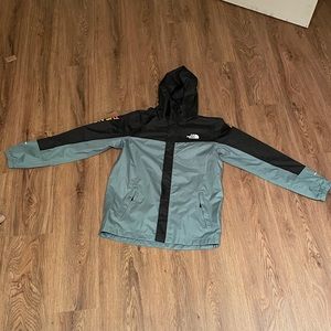 Black and green the north face windbreaker jacket